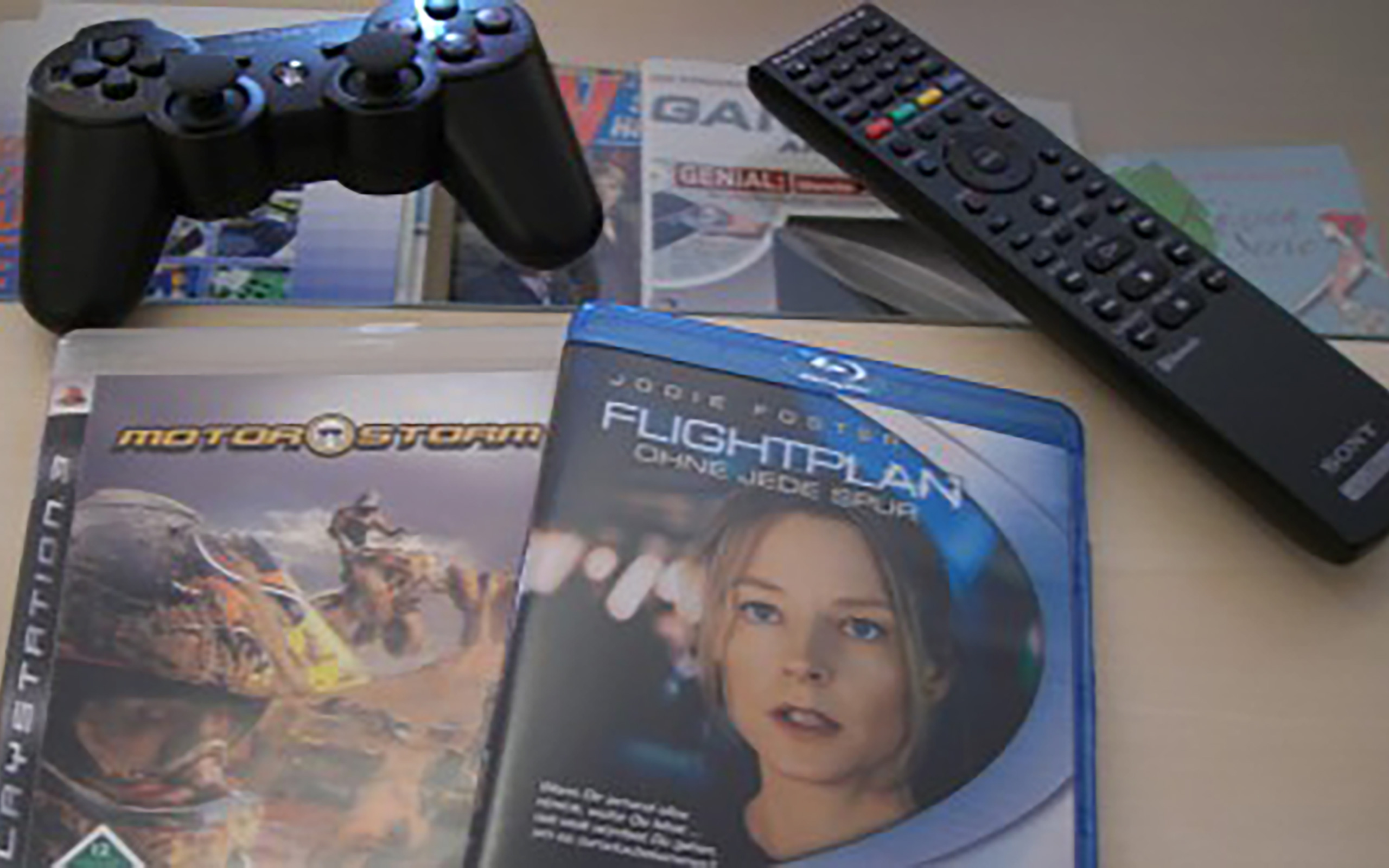 ps3_zubehoer SIXAXIS Wireless-Controller, Blu-ray Fernbedienung, "Motorstorm" + Bluy-ray "Flightplan"